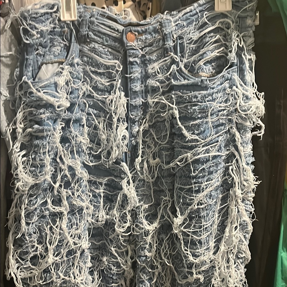 Distressed Blue Denim Jeans